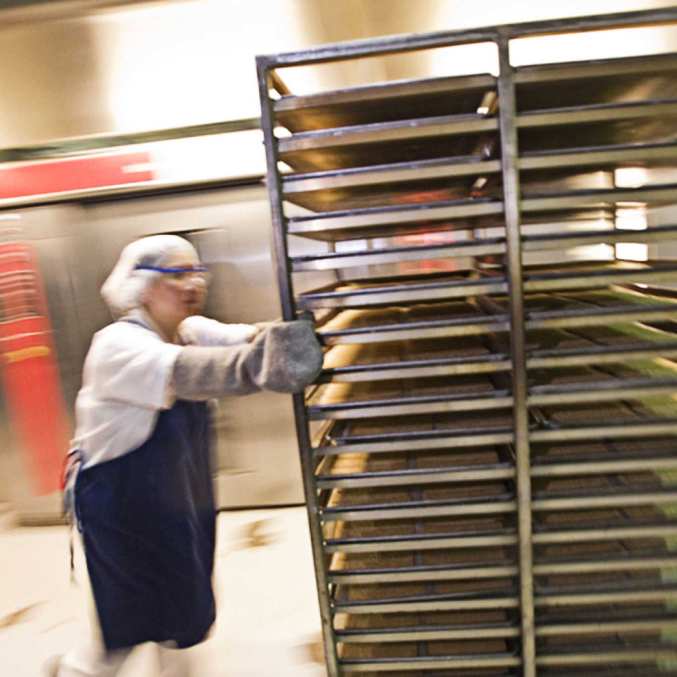 Man inspecting baked goods